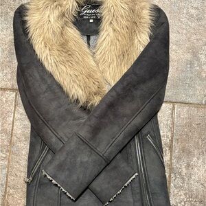 Guess zip up jacket, only worn a couple times. In great condition.